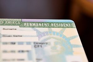 a green card that an EB-5 visa holder is applying for while he is working in the United States