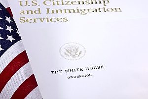 a packet of information about EB-5 visa funding from the USCIS to be followed by a business owner in Fairfax, VA