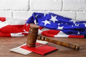immigration attorney gavel in front of an American flag