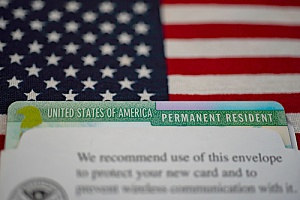 a green card received by a worker in the US who was on an H1B visa