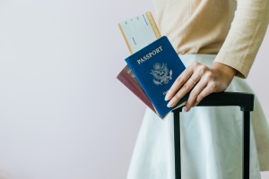 girl with her passport and Q Visa