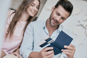 Husband Holding Wife's K3 Spousal Visa and Passport