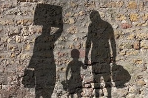 shadow of man women with belongings
