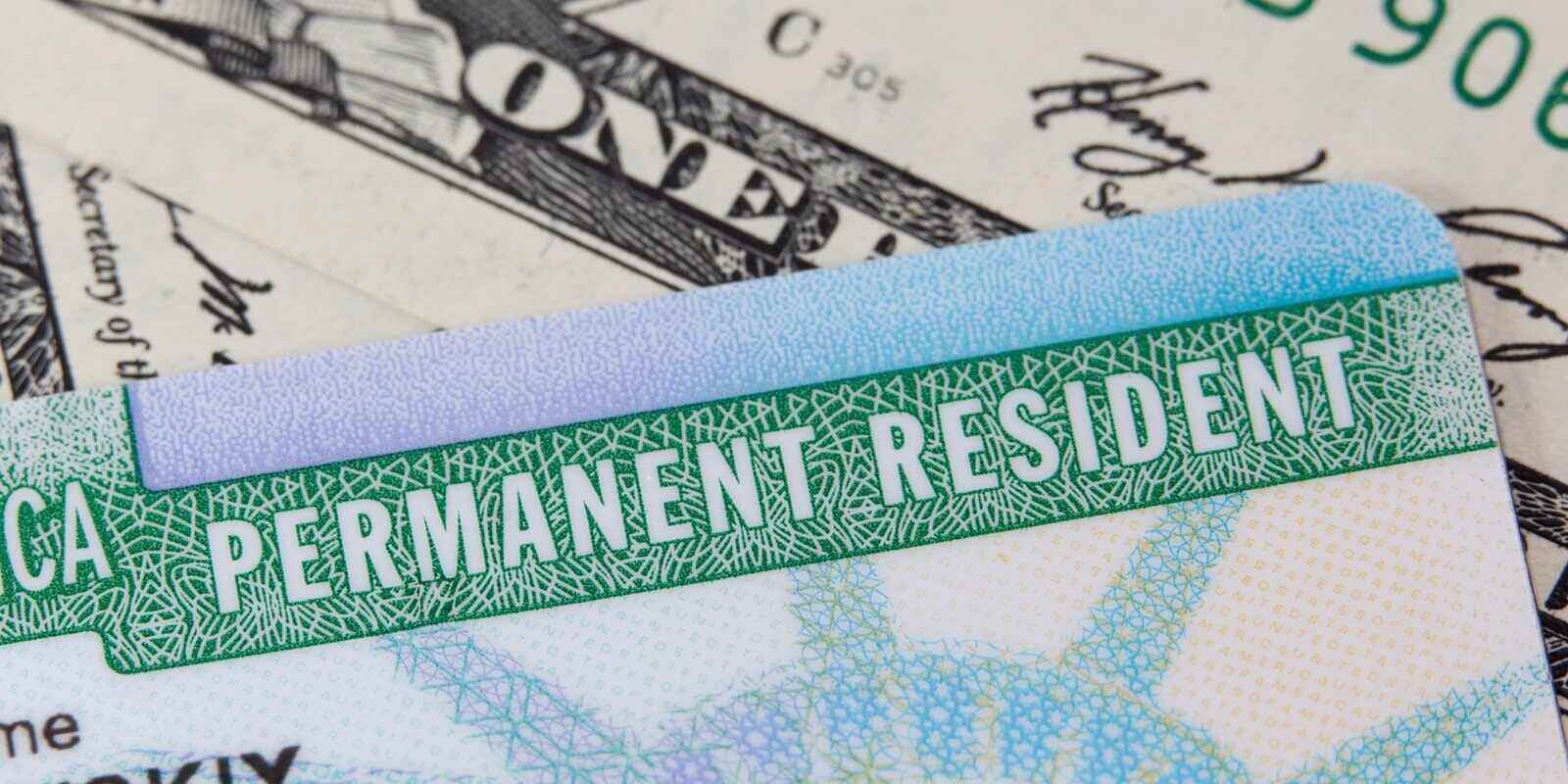 usa permanent resident card aka green card and paper money