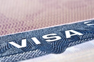 american tourist or green card visa on passport background